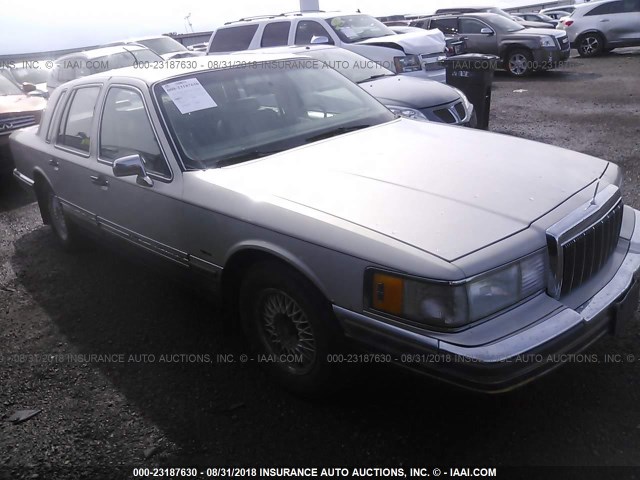 1LNLM83F0LY679415 - 1990 LINCOLN TOWN CAR CARTIER SILVER photo 1