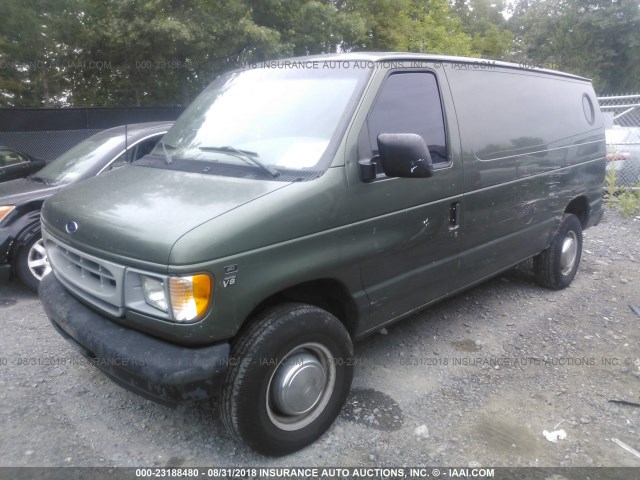 1FTSE34L22HA70586 - 2002 FORD ECONOLINE E350 SUPER DUTY VAN GREEN photo 2