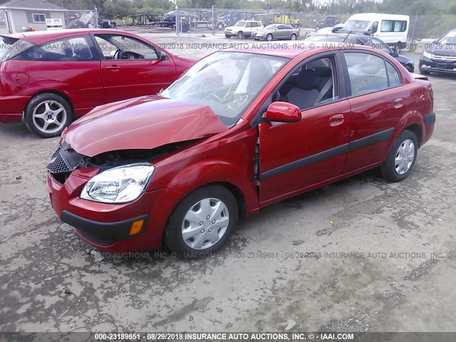 KNADE223296552886 - 2009 KIA RIO LX/SX RED photo 2