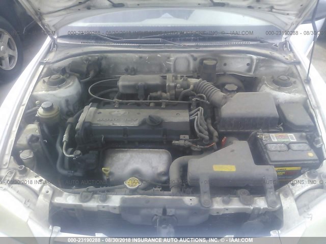 KMHCG35C31U115422 - 2001 HYUNDAI ACCENT GS WHITE photo 10