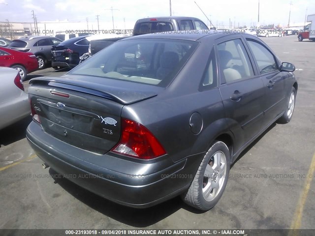 1FAHP38Z63W317534 - 2003 FORD FOCUS ZTS GRAY photo 4