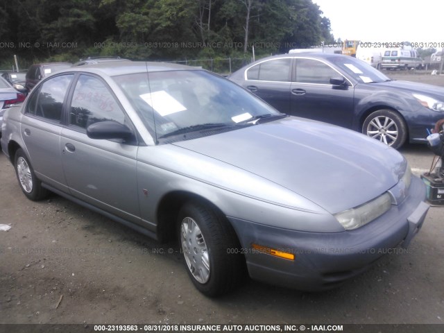 1G8ZH5280XZ119604 - 1999 SATURN SL1 SILVER photo 1