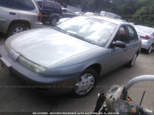 1G8ZH5280XZ119604 - 1999 SATURN SL1 SILVER photo 2