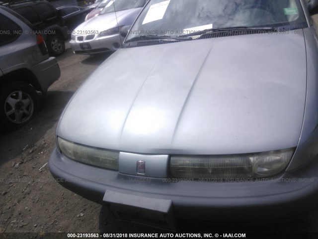 1G8ZH5280XZ119604 - 1999 SATURN SL1 SILVER photo 6