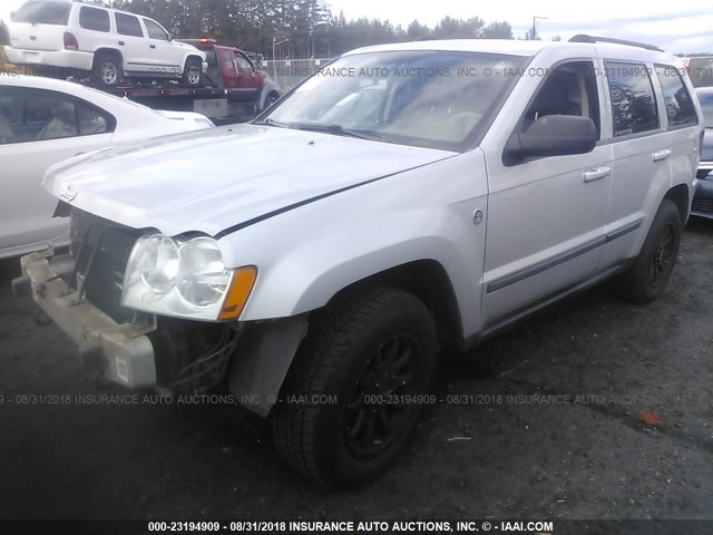 1J8HR48P77C555157 - 2007 JEEP GRAND CHEROKEE LAREDO/COLUMBIA/FREEDOM SILVER photo 2