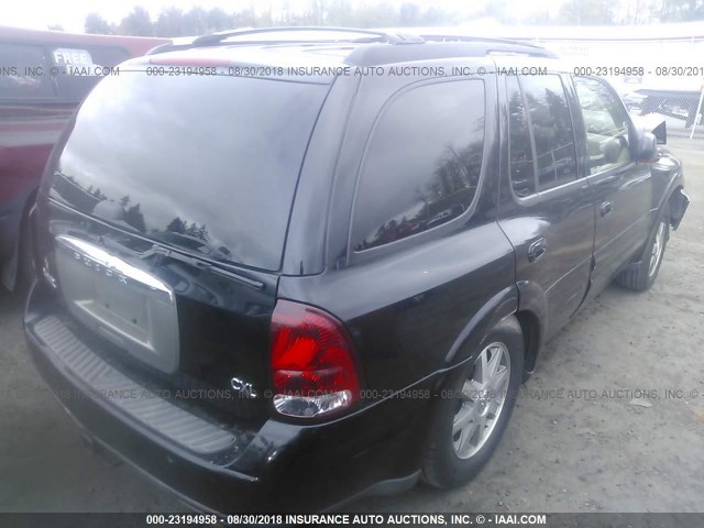 5GADT13S642170578 - 2004 BUICK RAINIER CXL BLACK photo 4