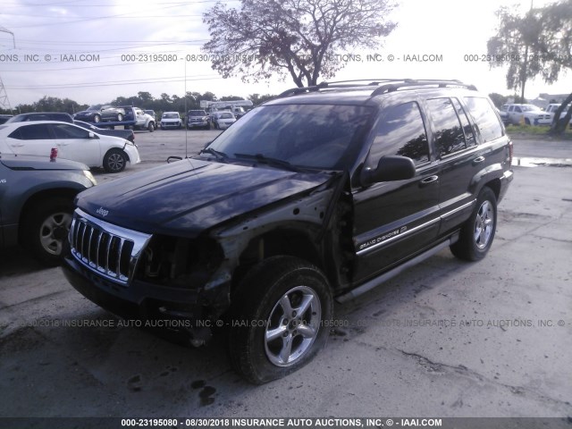 1J8GW68J74C136605 - 2004 JEEP GRAND CHEROKEE OVERLAND BLACK photo 2