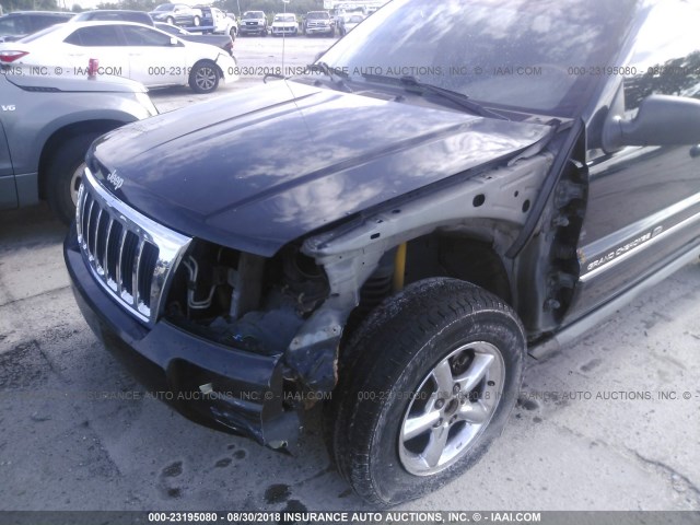 1J8GW68J74C136605 - 2004 JEEP GRAND CHEROKEE OVERLAND BLACK photo 6