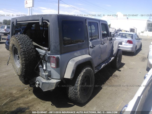 1C4BJWDG1FL519890 - 2015 JEEP WRANGLER UNLIMITE SPORT SILVER photo 4