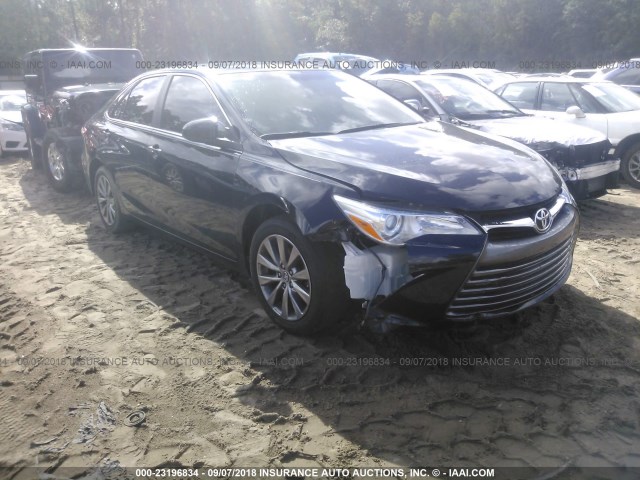 4T4BF1FK7GR551584 - 2016 TOYOTA CAMRY LE/XLE/SE/XSE BLACK photo 1