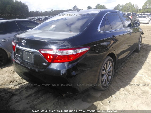 4T4BF1FK7GR551584 - 2016 TOYOTA CAMRY LE/XLE/SE/XSE BLACK photo 4