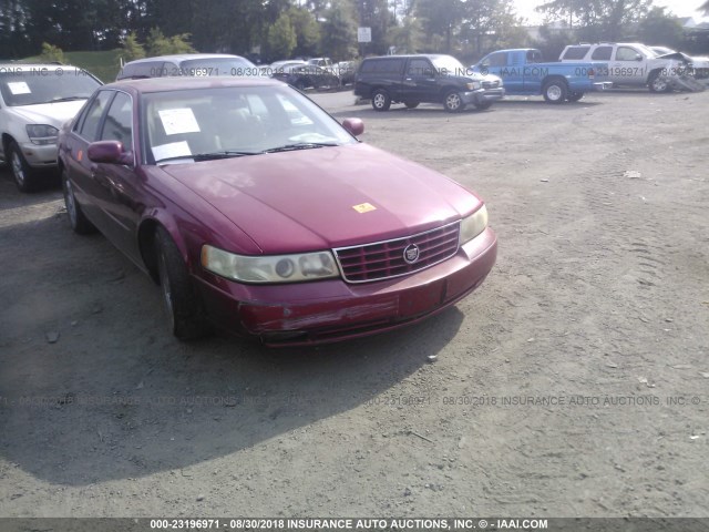 1G6KY549X3U196746 - 2003 CADILLAC SEVILLE STS RED photo 1