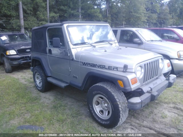 1J4FA29P4YP792279 - 2000 JEEP WRANGLER / TJ SE SILVER photo 1