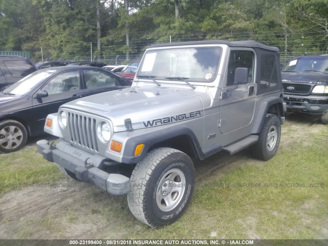 1J4FA29P4YP792279 - 2000 JEEP WRANGLER / TJ SE SILVER photo 2