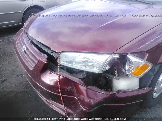 JT2BG28K0X0332528 - 1999 TOYOTA CAMRY LE/XLE RED photo 6