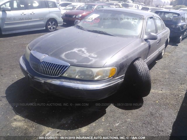 1LNHM97V9XY651406 - 1999 LINCOLN CONTINENTAL  Schwarz Foto 2