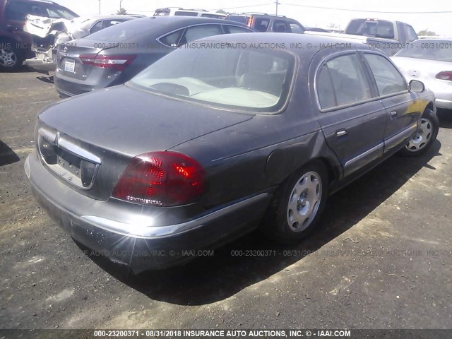 1LNHM97V9XY651406 - 1999 LINCOLN CONTINENTAL  Schwarz Foto 4