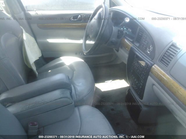 1LNHM97V9XY651406 - 1999 LINCOLN CONTINENTAL  Schwarz Foto 5