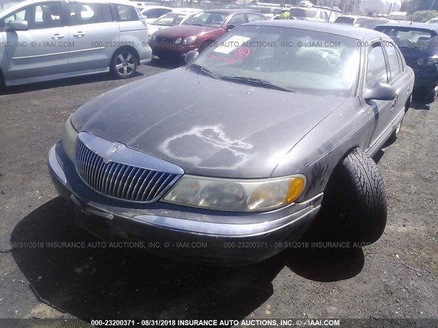 1LNHM97V9XY651406 - 1999 LINCOLN CONTINENTAL  Schwarz Foto 6