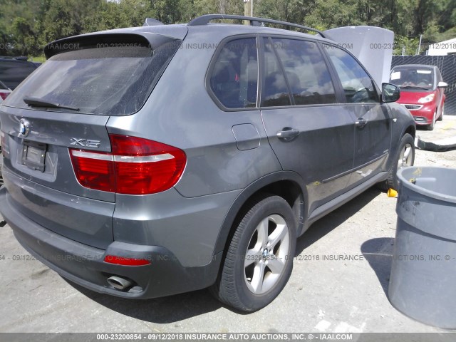 5UXFE4C59AL384742 - 2010 BMW X5 XDRIVE30I Մոխրագույն լուսանկար 4