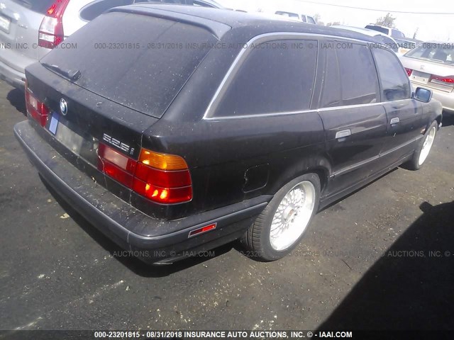 WBAHJ6329SGD26423 - 1995 BMW 525 IT AUTOMATIC BLACK photo 4