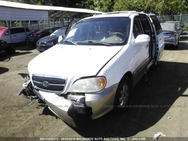 KNDUP131646557201 - 2004 KIA SEDONA EX/LX WHITE photo 2