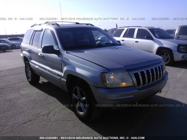 1J4GW58NX1C628524 - 2001 JEEP GRAND CHEROKEE LIMITED GRAY photo 1