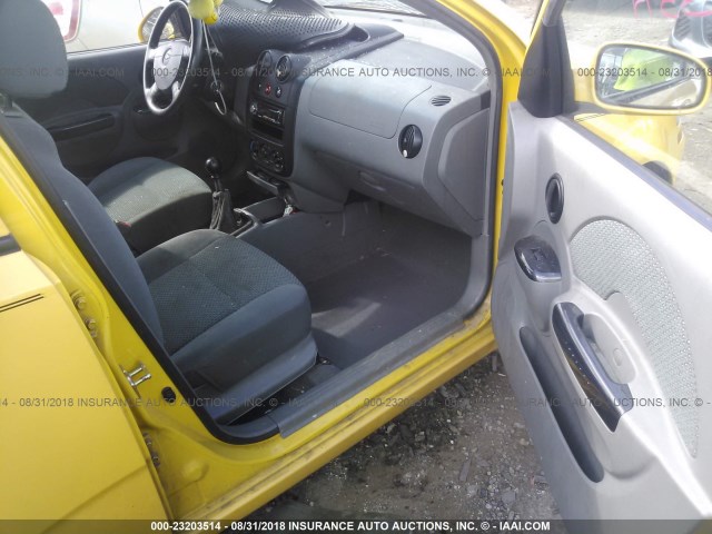 KL1TJ626X4B194844 - 2004 CHEVROLET AVEO LS YELLOW photo 5