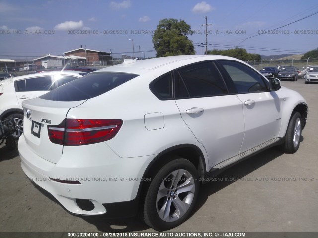 5UXFG2C55E0H10254 - 2014 BMW X6 XDRIVE35I WHITE photo 4