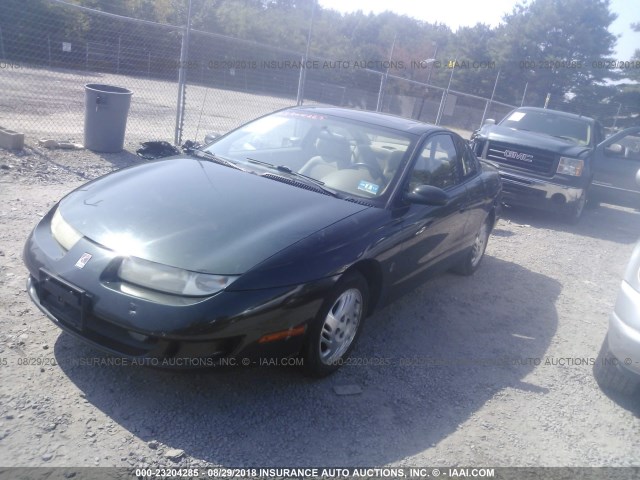 1G8ZR1273XZ329983 - 1999 SATURN SC2 GREEN photo 2