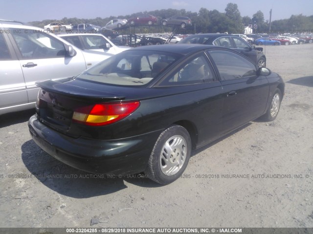 1G8ZR1273XZ329983 - 1999 SATURN SC2 GREEN photo 4