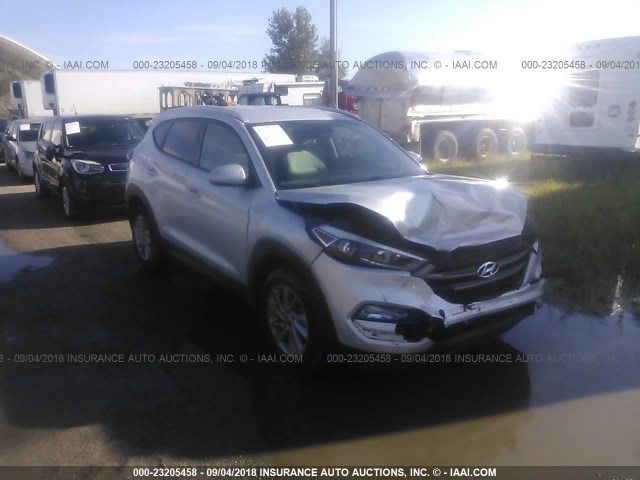 KM8J3CA41GU137039 - 2016 HYUNDAI TUCSON LIMITED/SPORT AND ECO/SE SILVER photo 1