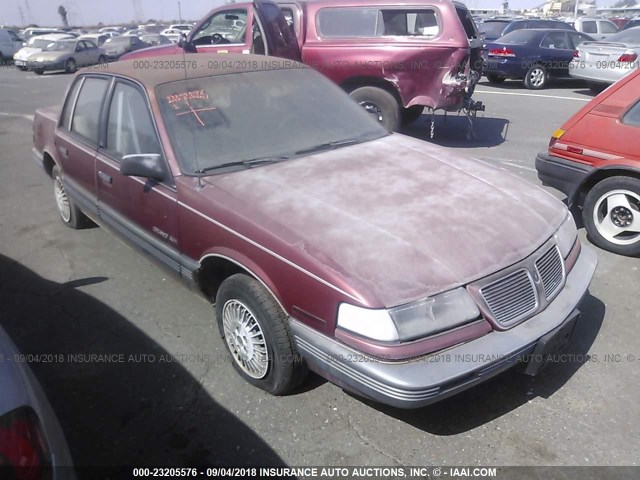 1G2NE54D8KC631327 - 1989 PONTIAC GRAND AM LE RED photo 1