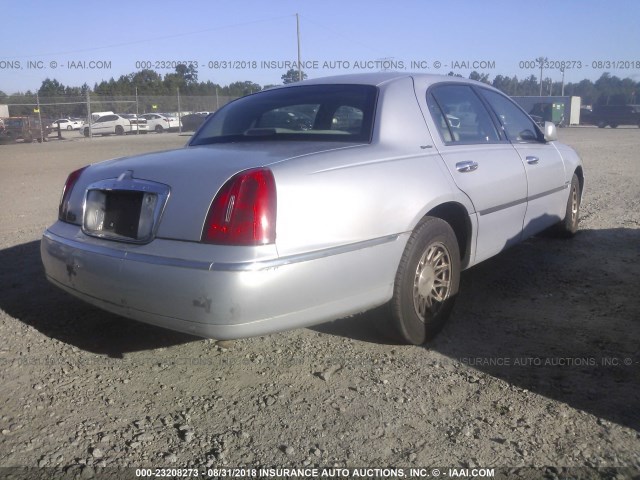 1LNFM82WXXY602135 - 1999 LINCOLN TOWN CAR SIGNATURE SILVER photo 4