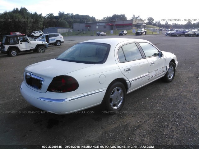 1LNHM97VX1Y654287 - 2001 LINCOLN CONTINENTAL  WHITE photo 4