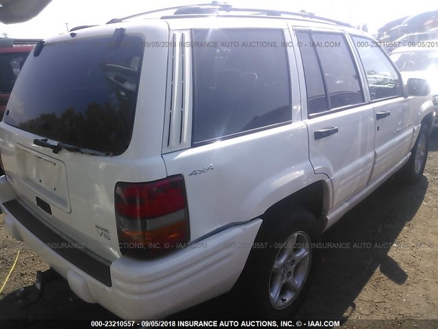 1J4GZ88Z5WC278478 - 1998 JEEP GRAND CHEROKEE LIMITED 5.9L WHITE photo 4