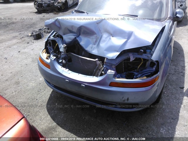 KL1TD66666B681589 - 2006 CHEVROLET AVEO LS Light Blue photo 6