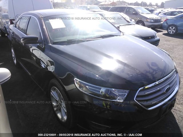 1FAHP2E8XHG127954 - 2017 FORD TAURUS SEL BLACK photo 1