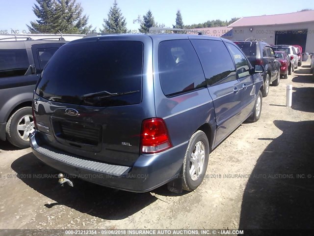 2FMZA522X6BA63190 - 2006 FORD FREESTAR SEL BLUE photo 4