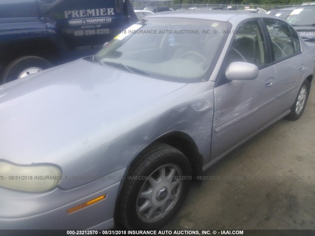 1G1ND52M7VY105076 - 1997 CHEVROLET MALIBU GRAY photo 6