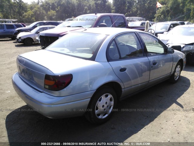 1G8ZH52882Z310468 - 2002 SATURN SL1 BLUE photo 4