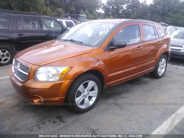 1B3CB3HA7BD191113 - 2011 DODGE CALIBER MAINSTREET ORANGE photo 2