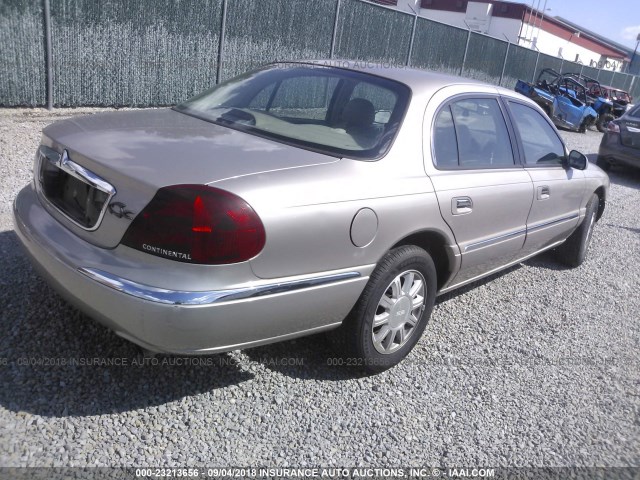 1LNHM97V0YY760189 - 2000 LINCOLN CONTINENTAL  GOLD photo 4