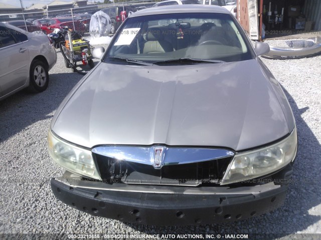 1LNHM97V0YY760189 - 2000 LINCOLN CONTINENTAL  GOLD photo 6