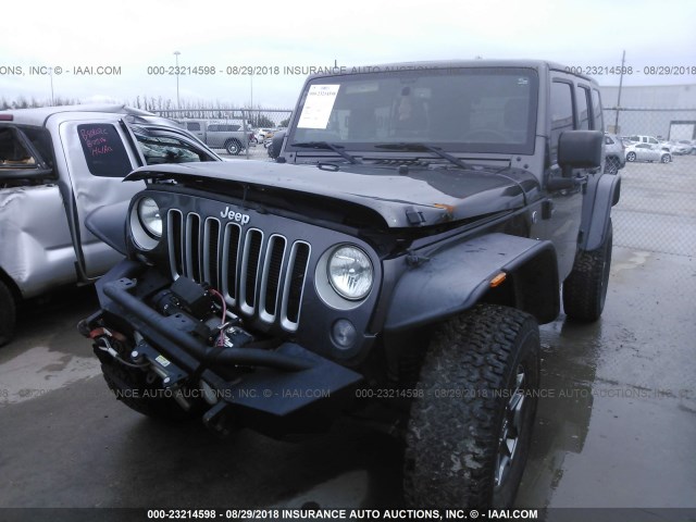 1C4BJWEG9GL249940 - 2016 JEEP WRANGLER UNLIMITE SAHARA GRAY photo 2