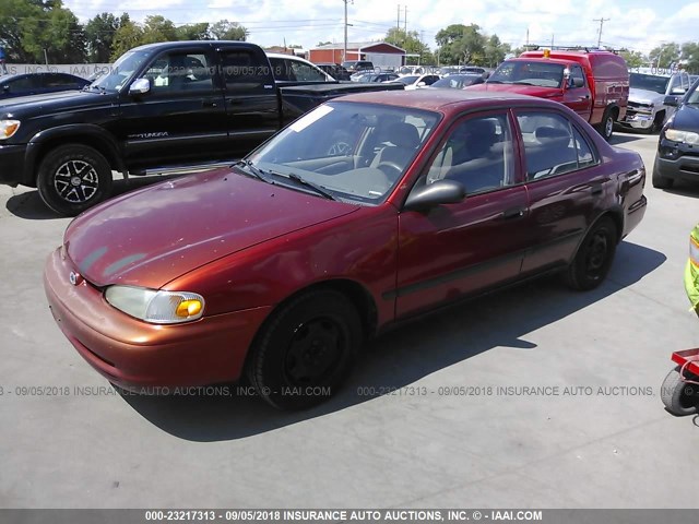 1Y1SK54822Z411331 - 2002 CHEVROLET GEO PRIZM LSI RED photo 2