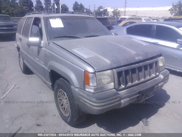 1J4GZ88Z8WC219831 - 1998 JEEP GRAND CHEROKEE LIMITED 5.9L SILVER photo 1