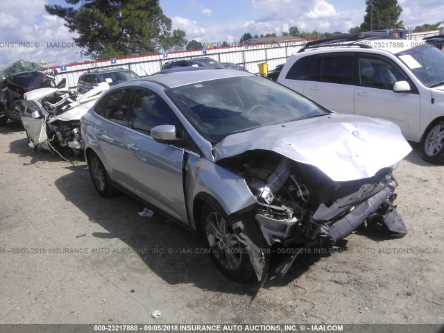 1FAHP3H26CL105849 - 2012 FORD FOCUS SEL SILVER photo 1