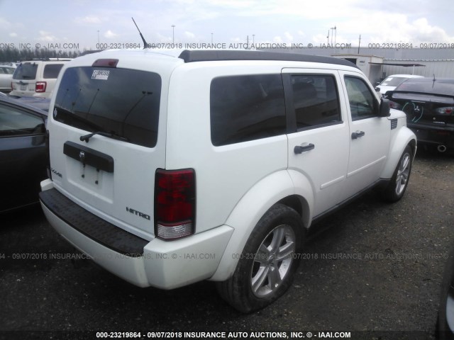 1D4PT4GK7BW584078 - 2011 DODGE NITRO HEAT WHITE photo 4