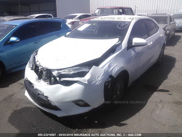 5YFBPRHE1EP165304 - 2014 TOYOTA COROLLA ECO/ECO PLUS/ECO PREMIUM WHITE photo 2